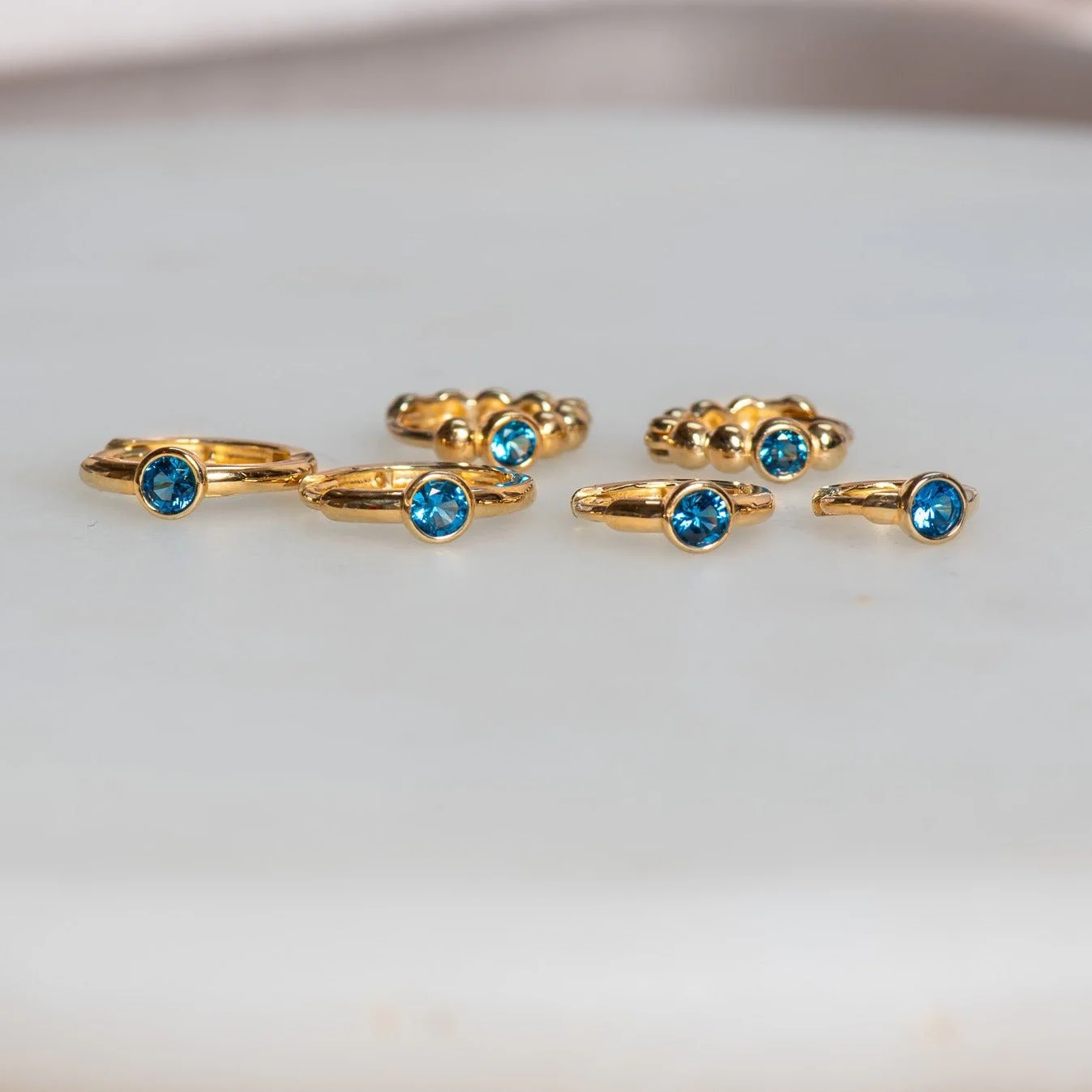 Yellow Gold Blue Topaz Bezel Stud - Image 10
