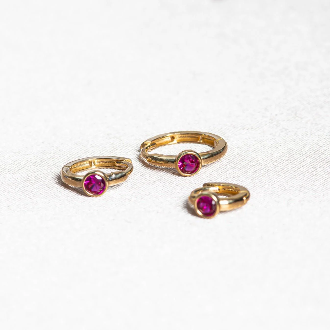 Yellow Gold Ruby Bezel Huggie Hoop - Image 11
