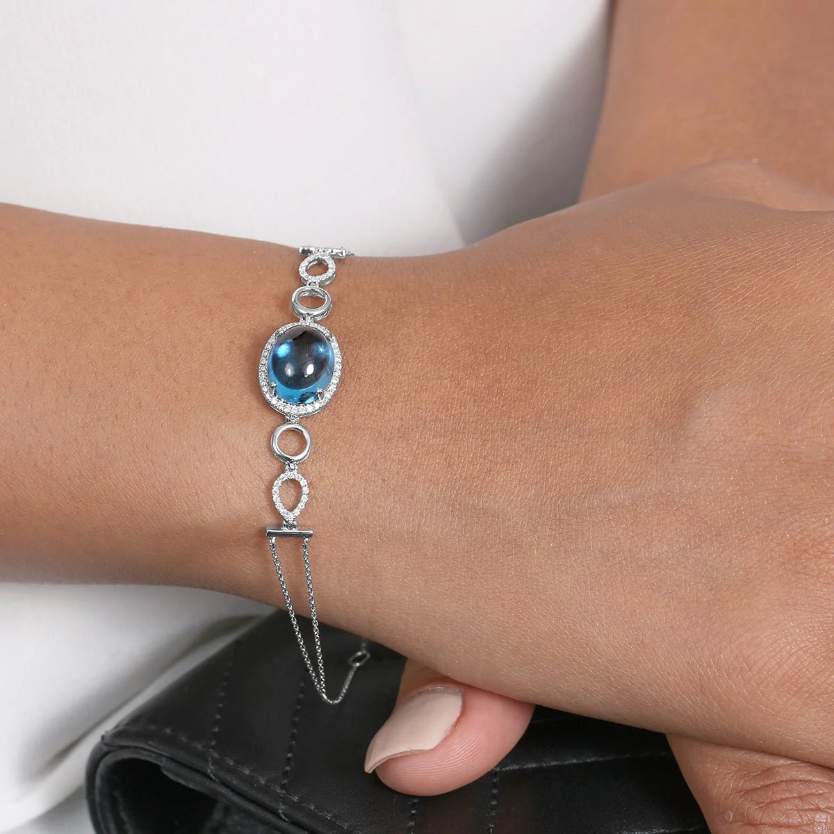 Blue Topaz and Diamond Infinity Heirloom Bracelet in Solid 14k White Gold - Image 2